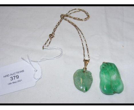 A carved jade pendant on chain together with one otherCONDITION REPORTBy our judgement, condition of lot is good, but would b
