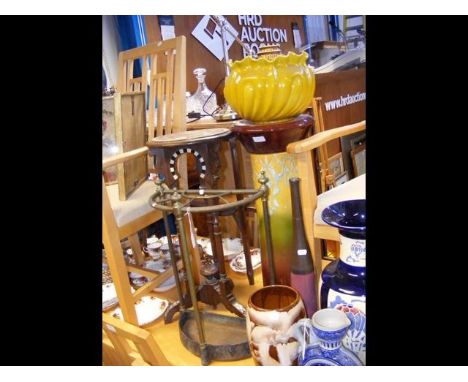 A brass umbrella stand, ceramic torchere and flowerpot, together with an inlaid wooden plant stand 