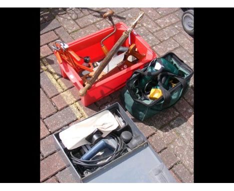 A Bosch electric planer together with other useful tools