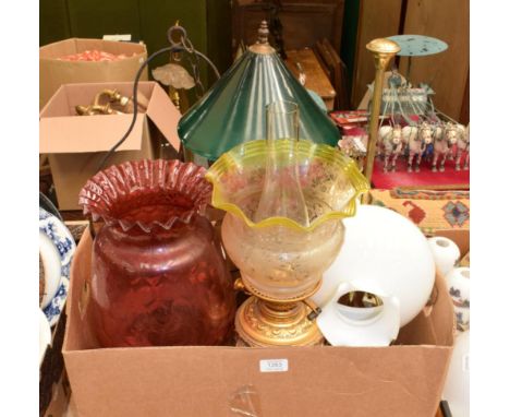 Five various Victorian and later oil lamps including a pendant example (some converted); and a brass pillar table lamp (6)The