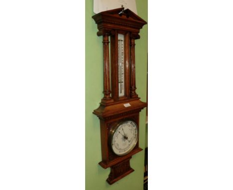 An oak cased aneroid barometer, retailed by John Mason, 36 High Street, Rotherham 