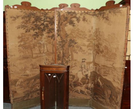 A pair of tapestry folding screens