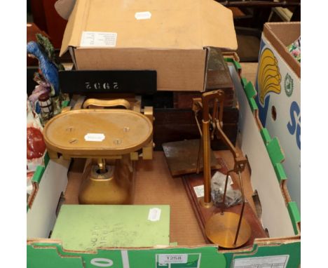 Assorted post office accessories including franking tools, precision letter scales and weights, parcel balance and weights et