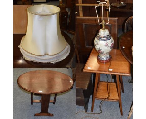 An Edwardian inlaid mahogany occasional table; an oak table with oval folding top; a pottery table lamp and two shades 