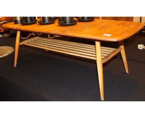 Ercol oblong coffee table in solid elm. L: 104 cm H: 36 cm