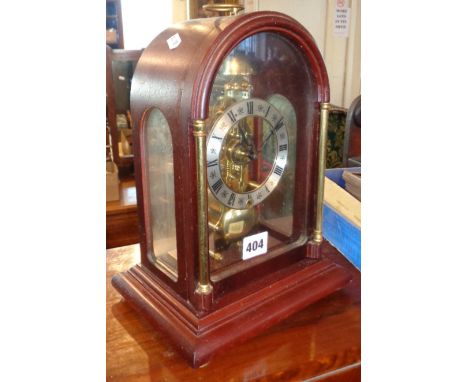 A Hermle 14 day mantel clock with skeleton movement