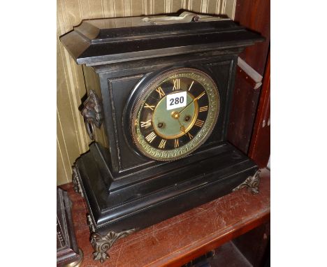 Victorian marble 8 day mantel clock with black chapter ring having brass Roman numerals and hands