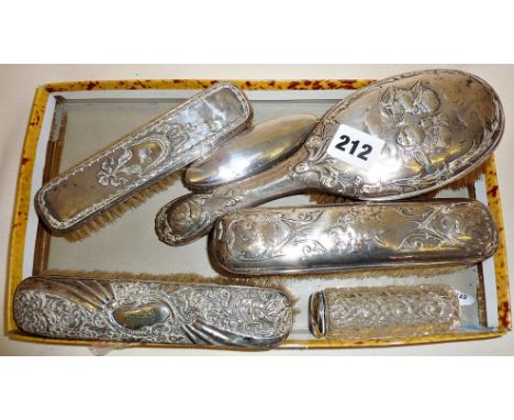 Art Nouveau silver backed vanity brushes, and mirror, silver topped glass pots etc.