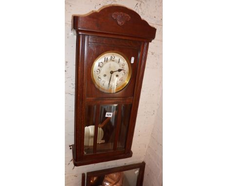 Oak wall clock and a dressing table mirror