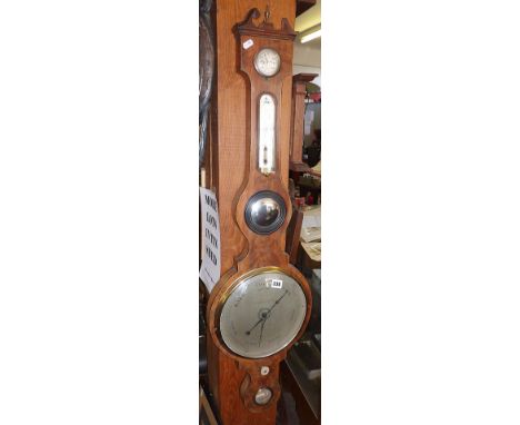 Early 19th c. crossbanded mahogany wheel barometer by F. Amadio &amp; Sons of London