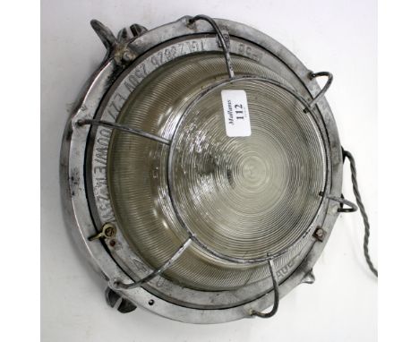 AN ALUMINIUM SHIPS BULKHEAD LAMP, 27cm diameter