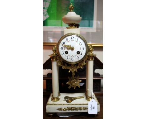 A LATE 19TH/EARLY 20TH CENTURY CONTINENTAL DRUM CLOCK, the gilt brass case on four turned white marble column supports united