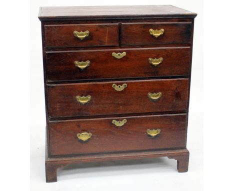 A GEORGIAN OAK CHEST OF TWO SHORT AND THREE LONG DRAWERS standing on bracket feet, 85cm wide x 96cm high