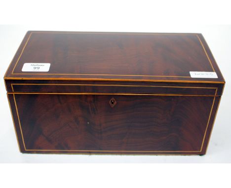 A GEORGE III MAHOGANY TEA CADDY with boxwood stringing, lion mask ring handles to the side and with interior lacking, 31cm wi