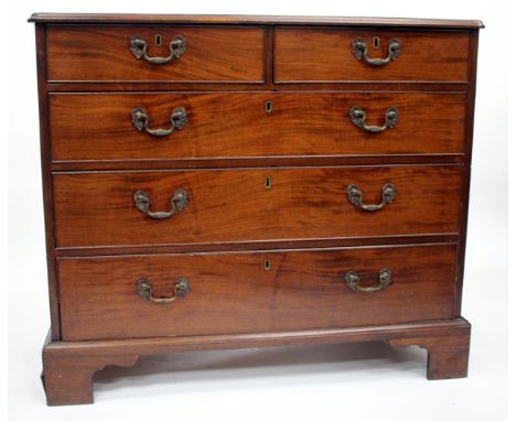 A GEORGE III MAHOGANY STRAIGHT FRONT CHEST of two short and three long drawers, with brass handles and on bracket feet, 96cm 