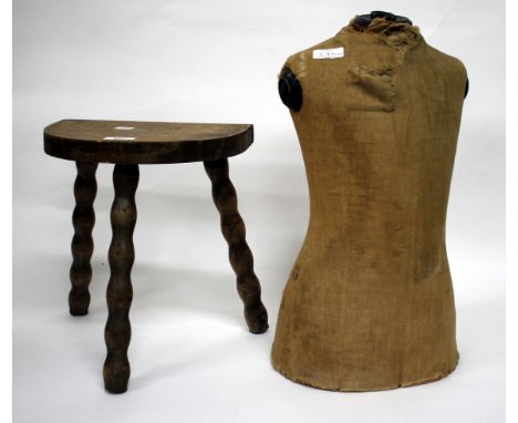 AN EARLY 20TH CENTURY MANNEQUIN 48cm in height together with a milking stool (2)