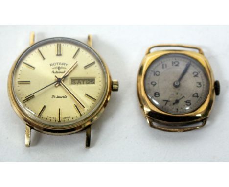 A ROTARY AUTOMATIC WRISTWATCH with 9 carat gold case and day and date subsidiary aperture and centre sweep second hand togeth