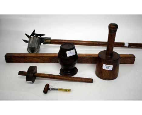 A TREEN STRING BARREL together with a turned wooden carvers mallet, a spirit level, a bradawl, a marking tool and a lawn edge