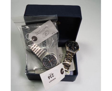 A presentation boxed Seiko 'Solar' titanium (100m) gentleman's wrist watch, together with a black dial gentleman's Seiko quar