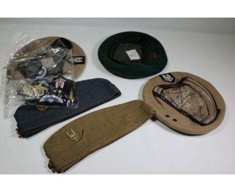 A badged Special Air Services (SAS) light skin coloured beret, and two other regiment hats, a collection of mostly airborne s