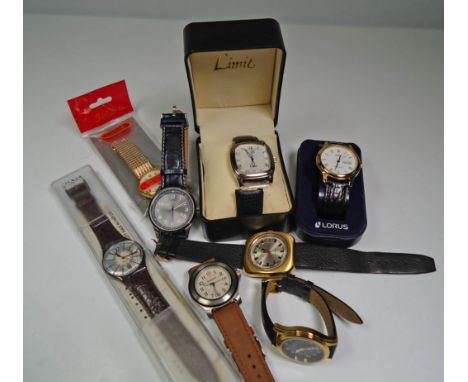 A gentleman's Timberland wrist watch, together with a Casio 'Jumbo' wrist watch, and a presentation boxed Swatch LB 135, and 