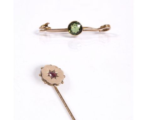 A Victorian stick pin with ruby setting together with a 9ct gold bar brooch with peridot setting