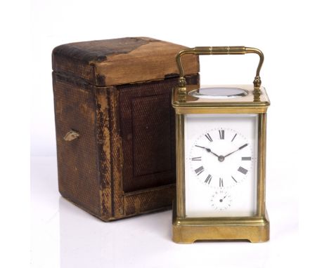 A French brass carriage clock with loop handle, enamel dial and alarm function by Henri Jacot, in original leather box