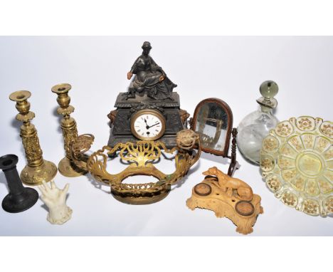 A group of pieces to include gilt metal candlesticks, a mantel clock and other items