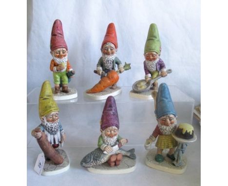 A collection of six Goebel figures, depicting garden gnomes.