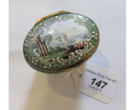 A late 18th century South Staffordshire (Bilston) enamel cashew box of oval waisted form, painted with romantic landscapes, t