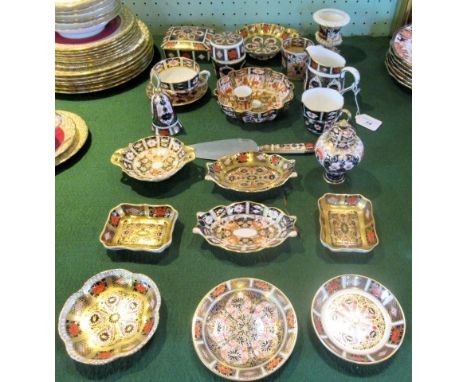 A large collection of Royal Crown Derby table and cabinet china, to include: dishes, cups, saucers and other related items.