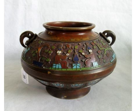 A 19th century Chinese bronze and Champleve enamel urn of archaic form.