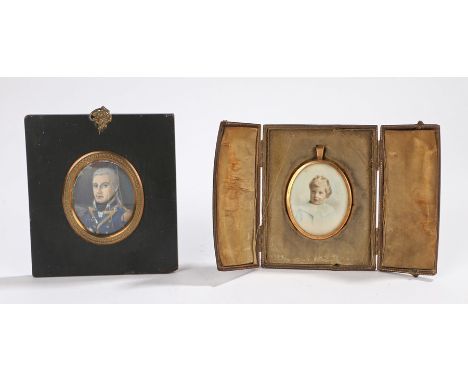 Two portrait miniatures, the first of an oil on ivory of a19th Century Officer with a blue tunic, 50mm diameter excluding the