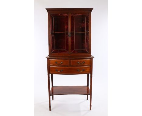 Victorian rosewood bow front cabinet on stand, the dentil moulded cornice above astragal glazed doors, two short and one long