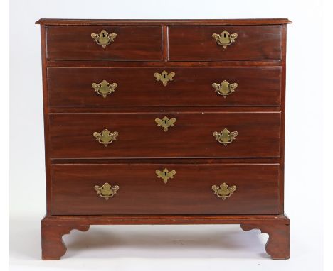 George III mahogany chest of drawers, the rectangular top above two short and three long graduated drawers on bracket feet, 9