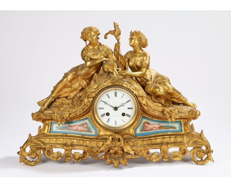 Late 19th Century French gilt metal mantel clock, Howell A Paris, with two reclining classical maidens pouring water above a 
