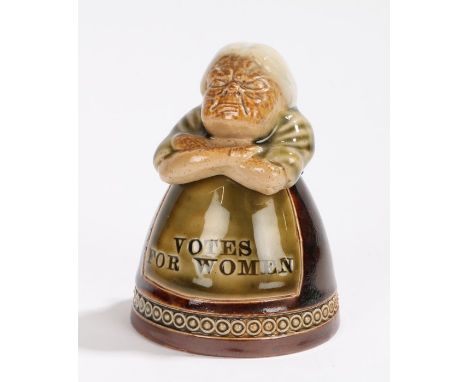 Royal Doulton suffragette interest inkwell, early 20th Century, the inkwell depicting a lady with her arms folded the green a
