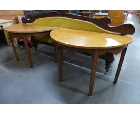 A pair of George III mahogany demi-lune console tables 71cms h, 113cms w, 61cms d 