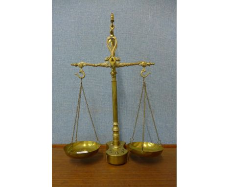 A set of Portuguese brass scales with weights 