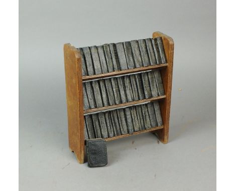 SHAKESPEARE, William, Works. 40 miniature vols in original three shelf bookcase. Allied Newspapers, 1930s. Each book is 2 inc