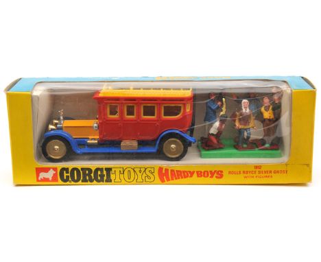 Corgi Toys ‘Hardy Boys’ 1912 Rolls Royce Silver Ghost (805). A multi coloured vehicle in red, blue and yellow with ladder fix