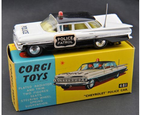 Corgi Toys Chevrolet Impala Police Car (481). In white with black roof and lower sides and yellow interior. ‘Police’ decal to