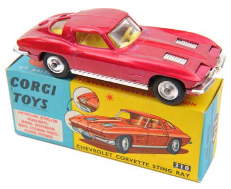 Corgi Toys Chevrolet Corvette Sting Ray (310). An example in metallic cerise with yellow interior. Boxed. Vehicle VGC-Mint sm
