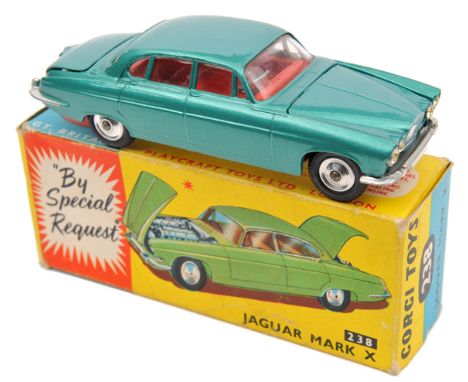 Corgi Toys Jaguar Mark X (238). A scarce example in metallic sea green with red interior. Boxed, minor wear, with leaflet. Ve
