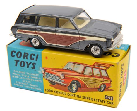 Corgi Toys Ford Consul Cortina Super Estate Car (491). An example in metallic grey with ‘woodwork’ to sides and cream interio