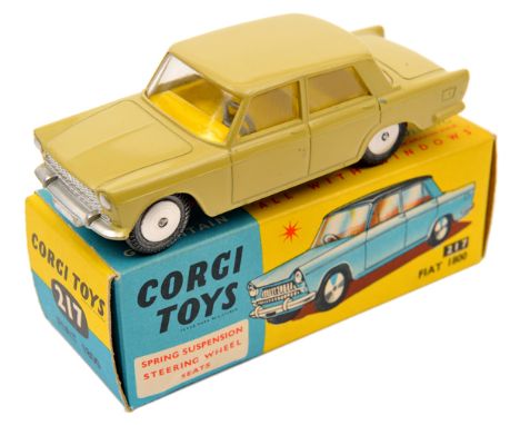 Corgi Toys Fiat 1800 (217). Example in mustard yellow with bright yellow interior. Boxed, minor wear/surface tear. Vehicle Mi