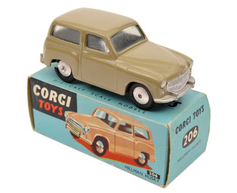 Corgi Toys Hillman Husky (206). In tan. In early all blue box, some surface t0-80earing to one side. Vehicle Mint. Plate 1