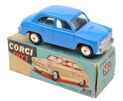 Corgi Toys Morris Cowley Saloon (202). An example in overall mid blue. In early box, worn/damaged. Vehicle VGC some light wea