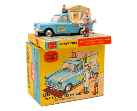 Corgi Toys Wall’s Ice Cream Van on Ford Thames (447). In light blue and cream livery with striped canopy. Boxed with display 