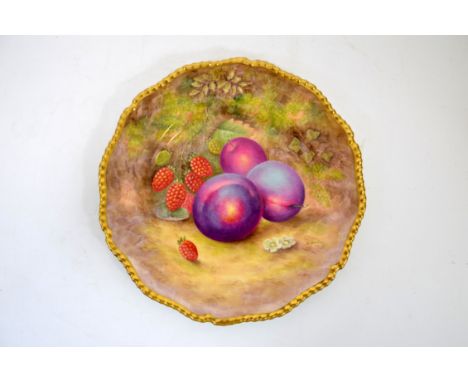 A Royal Worcester fruit painted plate, 1956, plums and raspberries, by H Ayrton, gilt gadrooned border, 27cm diameter